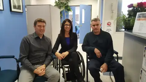 Facilitator engaging with participants during a classroom-style event