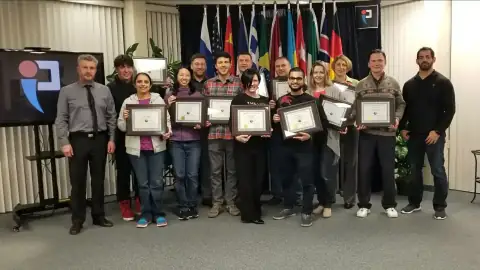 Group of START Canada graduates celebrating with certificates
