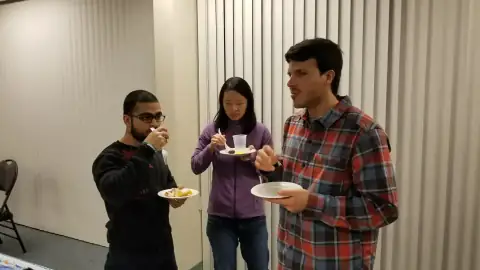Participants networking and chatting after an event session